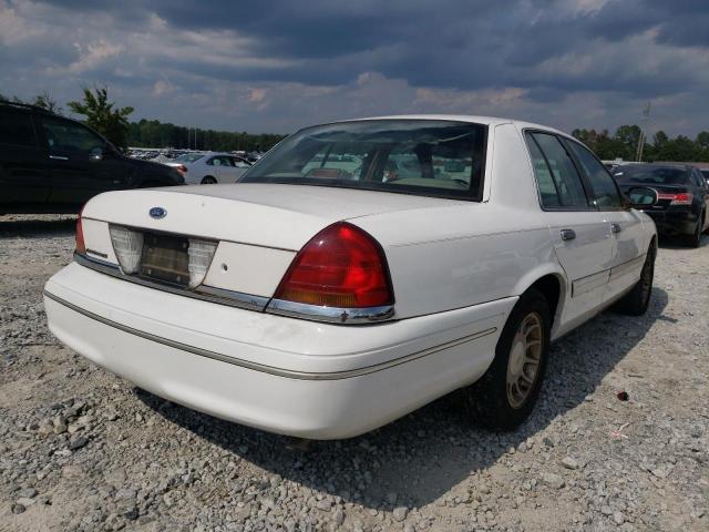 Photo 4 from auction – 1999 FORD CROWN VICT with VIN 2FAFP74W5XX102828