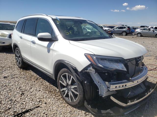 Photo 1 from auction – 2022 HONDA PILOT TOUR with VIN 5FNYF6H64NB001139