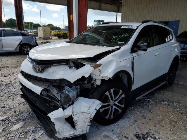 Photo 2 from auction – 2017 TOYOTA RAV4 LE with VIN JTMZFREV1HJ703904
