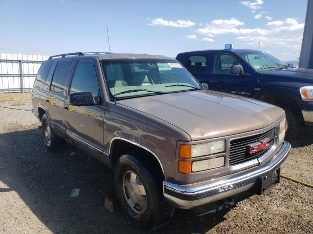 GMC YUKON 1998 with VIN 1GKEK13R3WJ706161 - Photo from auction
