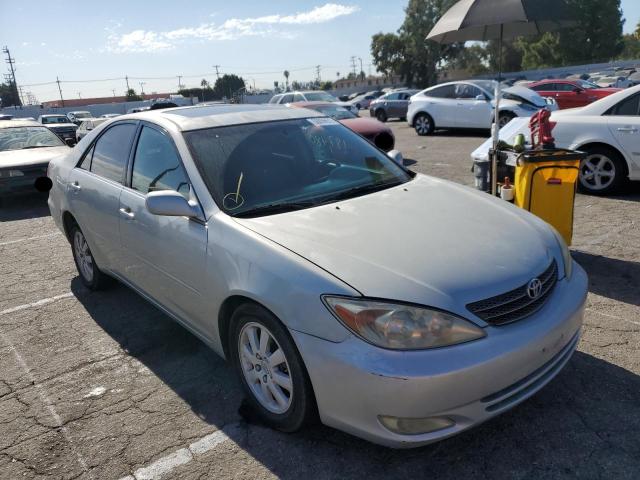 TOYOTA CAMRY LE 2003 with VIN 4T1BF30K23U050630 - Photo from auction
