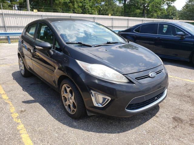 FORD FIESTA SES 2011 with VIN 3FADP4FJ3BM106291 - Photo from auction