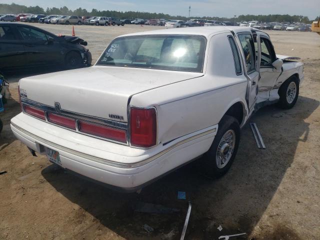 Photo 4 from auction – 1997 LINCOLN TOWN CAR E with VIN 1LNLM81W7VY758408