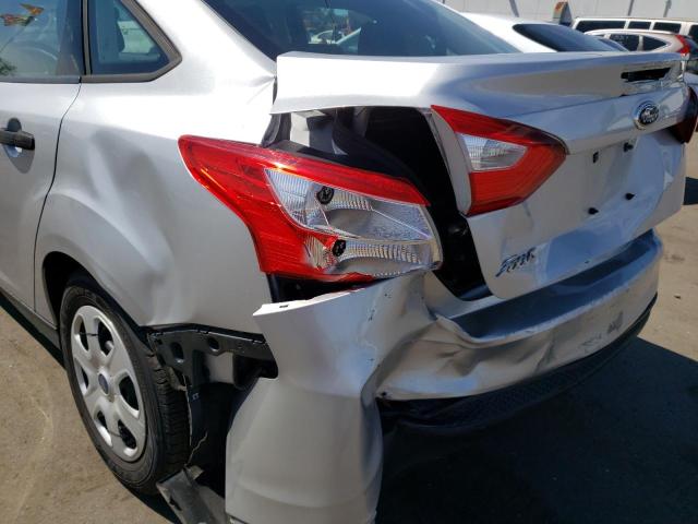 Photo 9 from auction – 2014 FORD FOCUS S with VIN 1FADP3E24EL454904