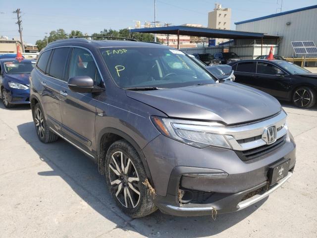HONDA PILOT TOUR 2019 with VIN 5FNYF5H61KB041068 - Photo from auction