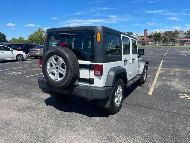 Photo 4 from auction – 2016 JEEP WRANGLER U with VIN 1C4BJWKG7GL315793