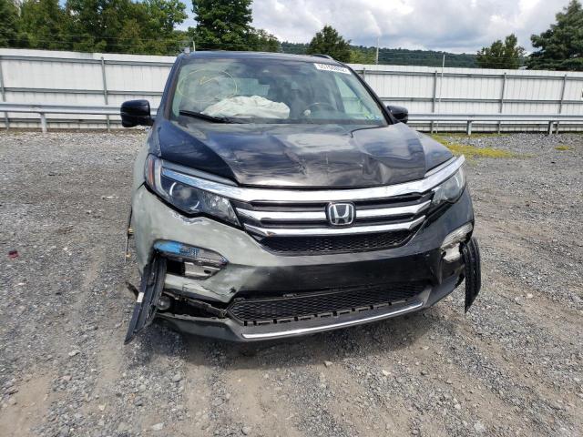 Photo 9 from auction – 2016 HONDA PILOT TOUR with VIN 5FNYF6H95GB128527