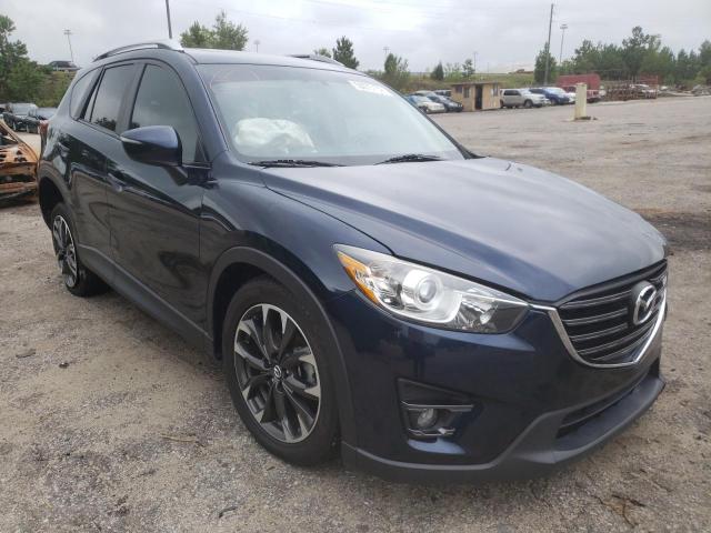 MAZDA CX-5 GT 2016 with VIN JM3KE2DY1G0709477 - Photo from auction