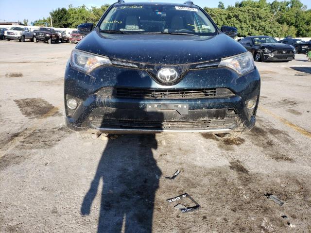 Photo 9 from auction – 2017 TOYOTA RAV4 XLE with VIN JTMRFREV8HJ107723