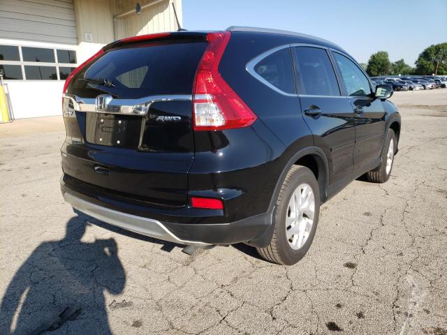 Photo 4 from auction – 2015 HONDA CR-V EXL with VIN 2HKRM4H71FH682659