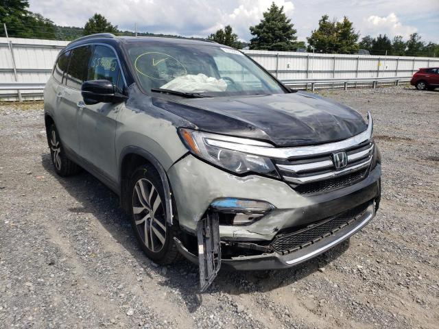 HONDA PILOT TOUR 2016 with VIN 5FNYF6H95GB128527 - Photo from auction
