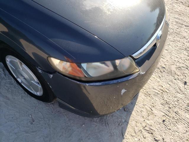 Photo 9 from auction – 2007 HONDA CIVIC HYBR with VIN JHMFA36227S027506