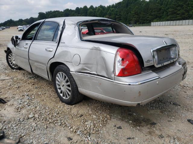 Photo 3 from auction – 2004 LINCOLN TOWN CAR E with VIN 1LNHM81W54Y677816