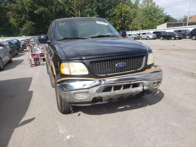 Photo 9 from auction – 2002 FORD F150 with VIN 1FTRX18L32NA41431