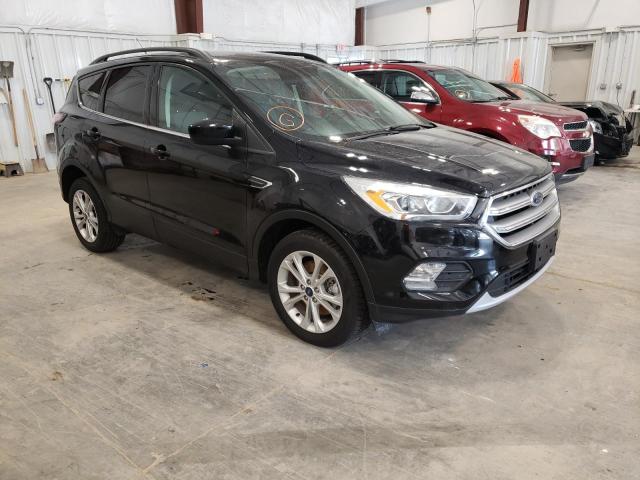 Photo 1 from auction – 2017 FORD ESCAPE SE with VIN 1FMCU9GD9HUB71795