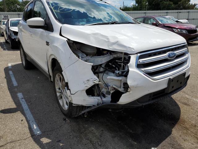 Photo 9 from auction – 2018 FORD ESCAPE SE with VIN 1FMCU9GD8JUA50729
