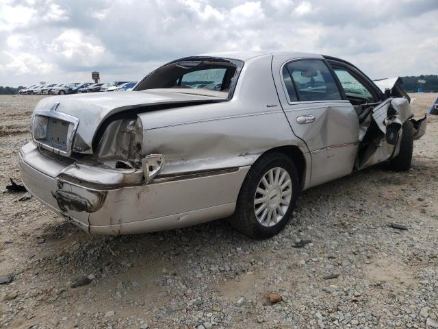 Photo 4 from auction – 2004 LINCOLN TOWN CAR E with VIN 1LNHM81W54Y677816