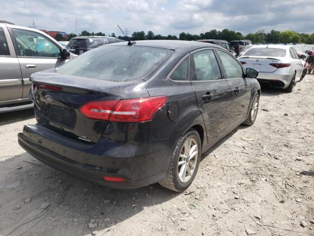 Photo 4 from auction – 2015 FORD FOCUS SE with VIN 1FADP3F22FL305522