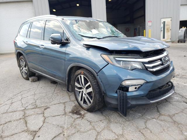 Photo 1 from auction – 2016 HONDA PILOT TOUR with VIN 5FNYF6H92GB007499