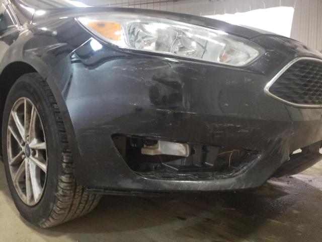 Photo 9 from auction – 2018 FORD FOCUS SE with VIN 1FADP3F25JL225995