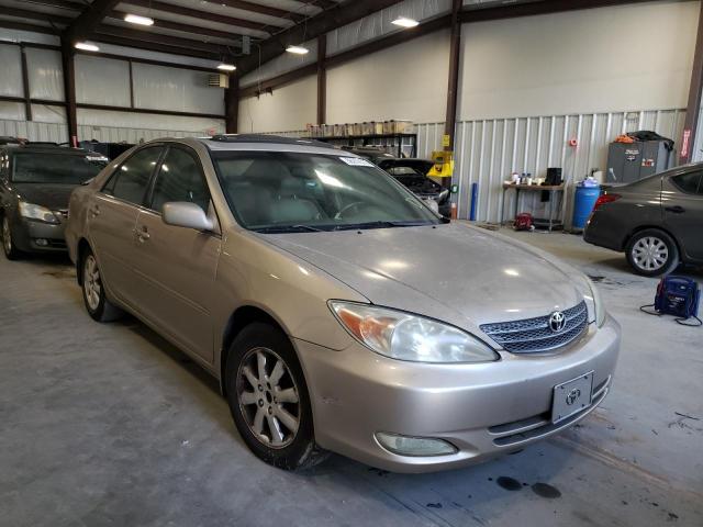 TOYOTA CAMRY LE 2003 with VIN 4T1BF30K93U043044 - Photo from auction