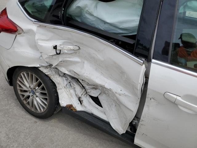 Photo 9 from auction – 2012 FORD FOCUS SEL with VIN 1FAHP3M24CL248689