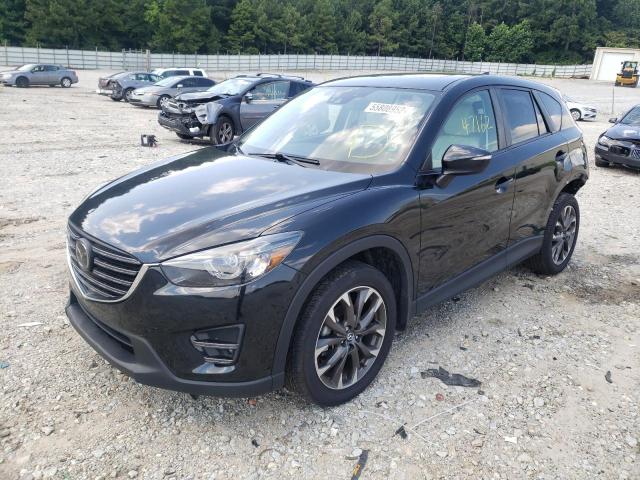 Photo 2 from auction – 2016 MAZDA CX-5 GT with VIN JM3KE2DY3G0779563