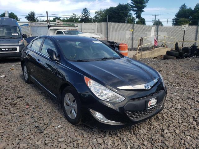 HYUNDAI SONATA HYB 2015 with VIN KMHEC4A40FA139212 - Photo from auction