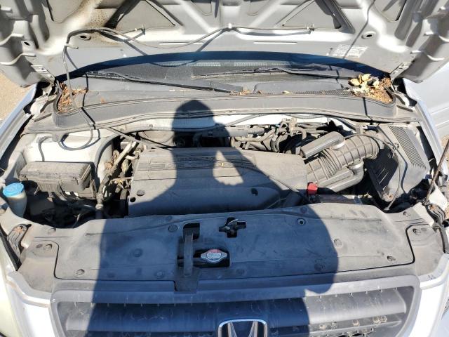 Photo 7 from auction – 2004 HONDA PILOT EXL with VIN 2HKYF18674H575138