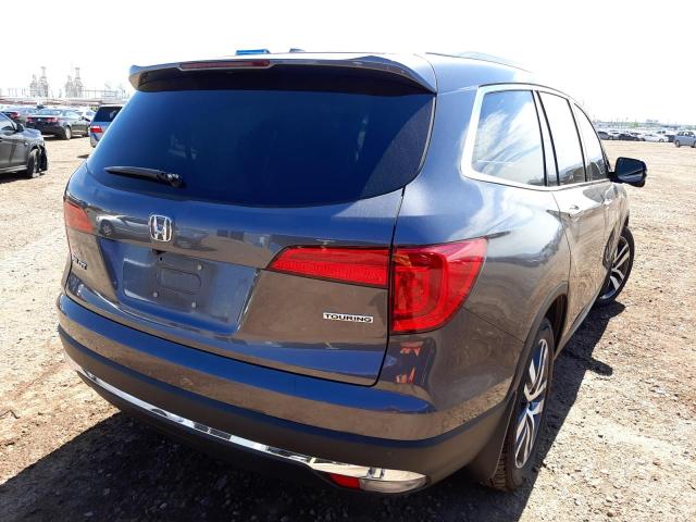 Photo 4 from auction – 2017 HONDA PILOT TOUR with VIN 5FNYF5H95HB044834