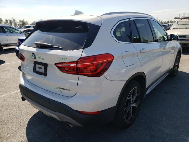 Photo 4 from auction – 2018 BMW X1 XDRIVE2 with VIN WBXHT3C3XJ5L35128