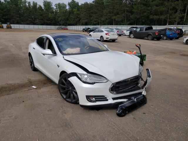 TESLA MODEL S 2013 with VIN 5YJSA1CPXDFP07974 - Photo from auction