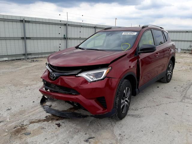 Photo 2 from auction – 2018 TOYOTA RAV4 LE with VIN JTMZFREV4JD124801