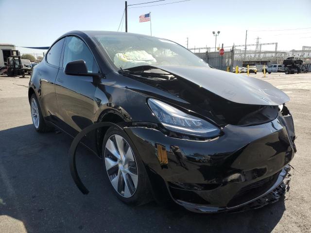 TESLA MODEL Y 2022 with VIN 7SAYGDEE6NF319425 - Photo from auction
