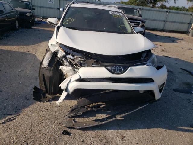 Photo 9 from auction – 2018 TOYOTA RAV4 with VIN JTMWFREV2JJ164914