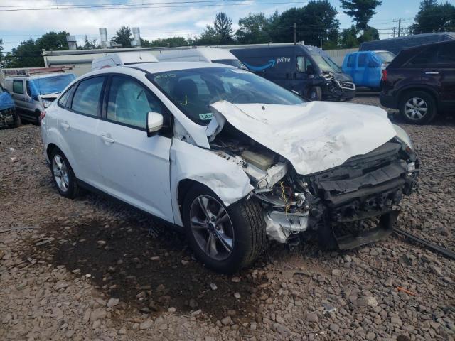 FORD FOCUS SE 2014 with VIN 1FADP3F20EL202114 - Photo from auction