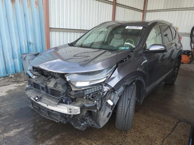Photo 2 from auction – 2018 HONDA CR-V TOURI with VIN 7FARW2H94JE033451