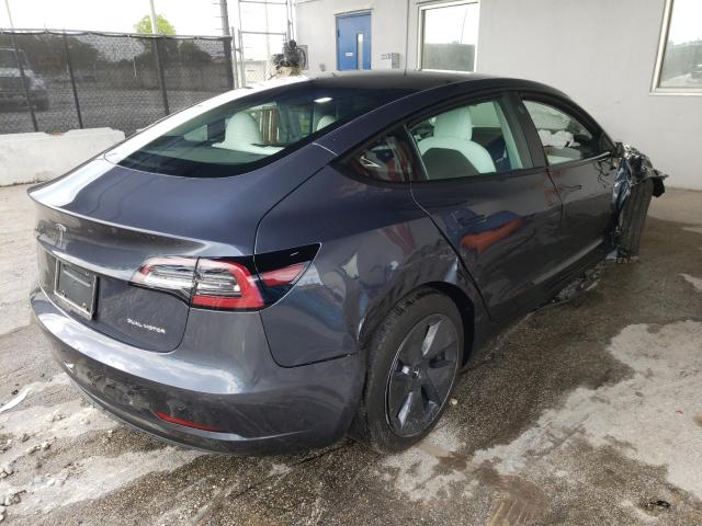 Photo 4 from auction – 2022 TESLA MODEL 3 with VIN 5YJ3E1EB4NF101159
