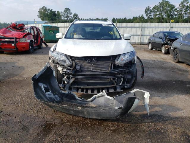 Photo 9 from auction – 2015 NISSAN ROGUE S with VIN 5N1AT2MVXFC830243