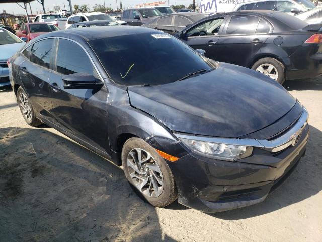 HONDA CIVIC EX 2018 with VIN 2HGFC2F75JH572990 - Photo from auction