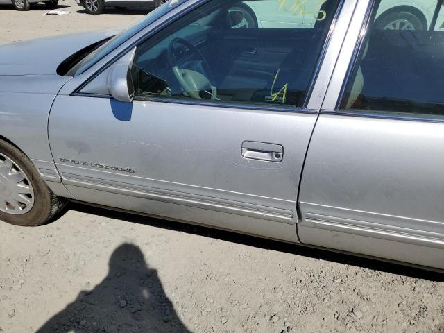 Photo 9 from auction – 1999 CADILLAC DEVILLE CO with VIN 1G6KF5496XU792156