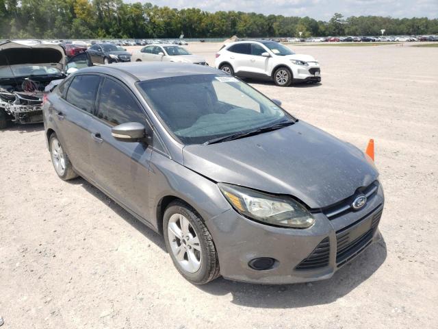 FORD FOCUS SE 2014 with VIN 1FADP3F24EL168338 - Photo from auction