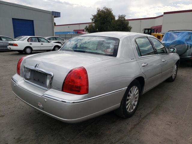 Photo 4 from auction – 2004 LINCOLN TOWN CAR U with VIN 1LNHM83WX4Y647501
