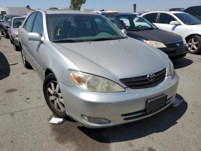 TOYOTA CAMRY LE 2003 with VIN 4T1BF30K13U048769 - Photo from auction