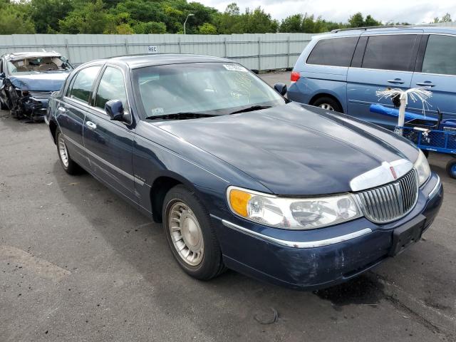 LINCOLN TOWN CAR E 2001 with VIN 1LNHM81W81Y683587 - Photo from auction