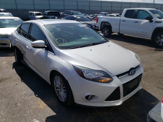 FORD FOCUS TITA 2014 with VIN 1FADP3J27EL350185 - Photo from auction