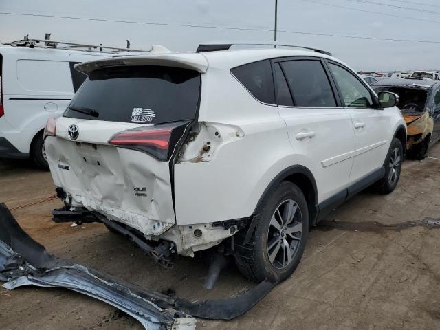 Photo 4 from auction – 2016 TOYOTA RAV4 XLE with VIN JTMRFREV7GJ098818