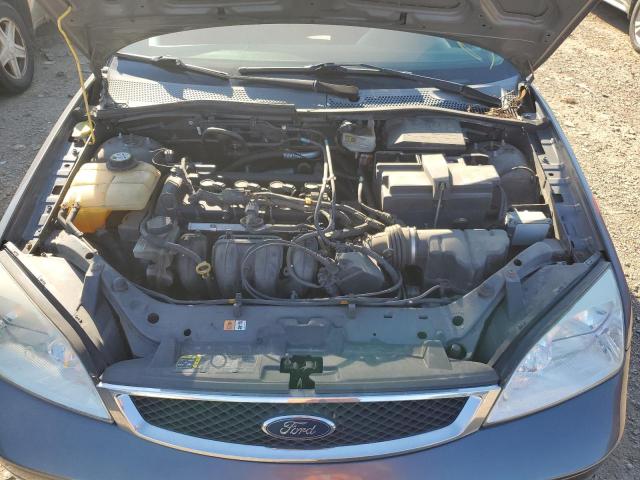 Фото 7 с аукциона – 2007 FORD FOCUS с VIN 1FAHP34N77W274735