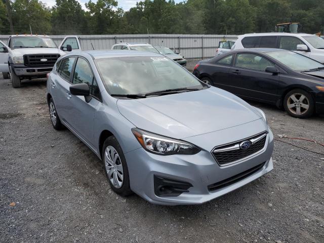 SUBARU IMPREZA 2019 with VIN 4S3GTAA65K3752177 - Photo from auction