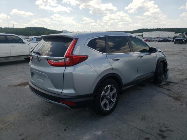 Photo 4 from auction – 2018 HONDA CR-V EXL with VIN 7FARW1H85JE044606